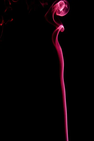 Red plume of smoke on a black background — Stock Photo, Image