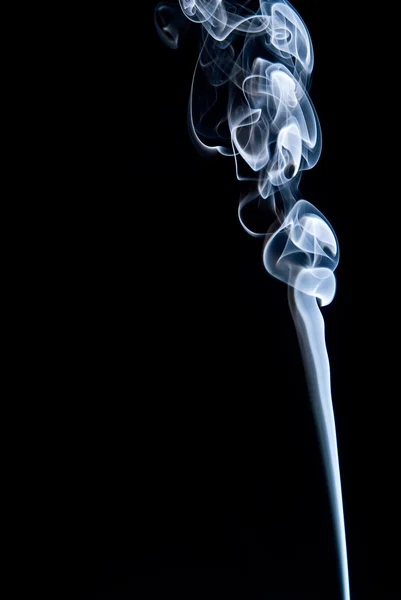 A stream of blue smoke on a black background — Stock Photo, Image