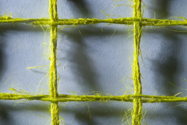 Close-up of a grid cell coarse linen — Stock Photo, Image