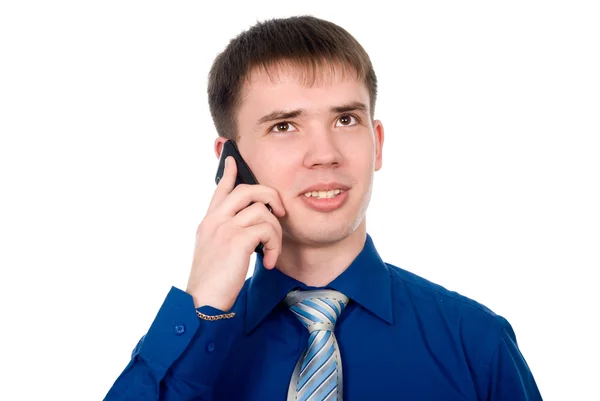 Um jovem falando ao telefone. — Fotografia de Stock