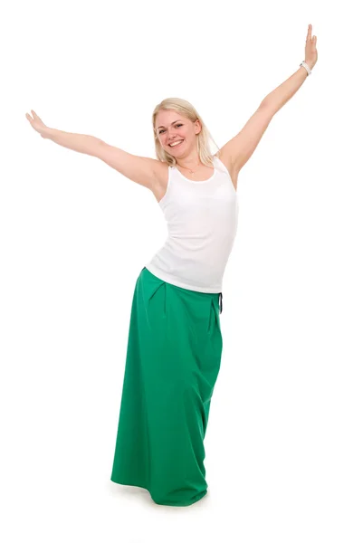 Beautiful female student in a green skirt with hands raised — Stock Photo, Image