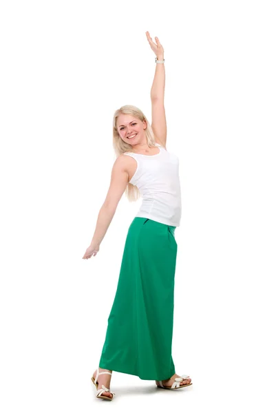 Beautiful female student in a green skirt with hands raised. — Stock Photo, Image
