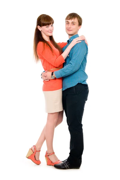 Boy and girl in love cuddling in full growth — Stock Photo, Image