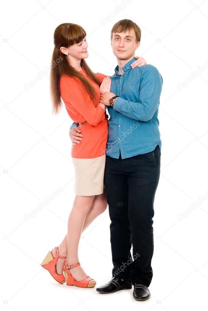 Lovers of boy and girl holding hands in full view
