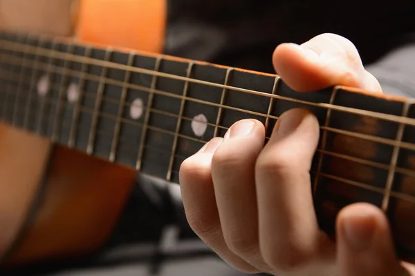 Musical instrument with performer hands — Stock Photo, Image