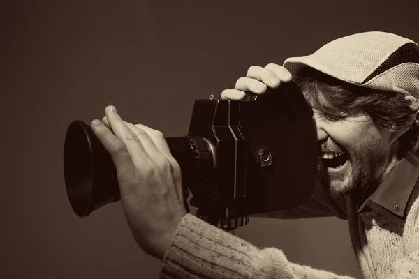 Man with retro camera. cinema operator — 스톡 사진