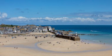 panoramic view of st ives beach town and harbour cornwall with many people
