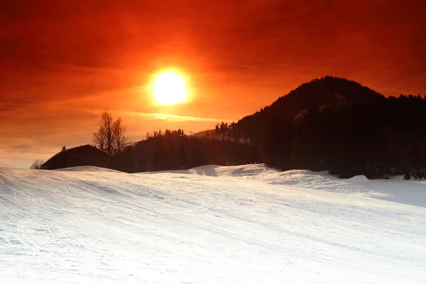 Zonsondergang in kirchberg, tirol in Oostenrijk — Stockfoto