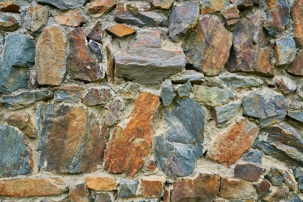Una imagen detallada de un muro de piedra. Fondo de textura de pared de piedra vieja para diseño y decoración. — Foto de Stock