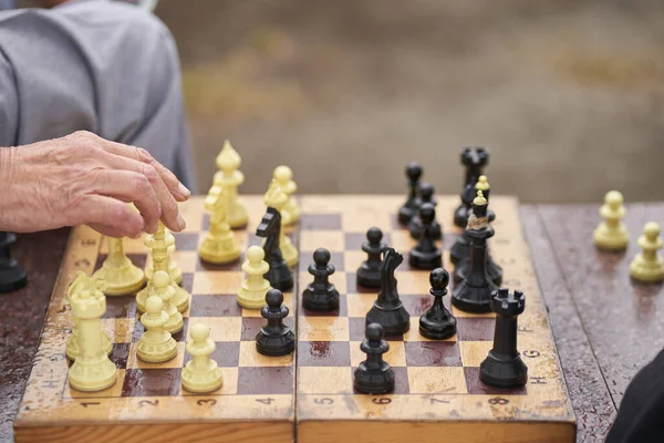 Two men are playing chess. Chess board game concept of business ideas and competition and strategic plan the meaning of success — Stock Photo, Image