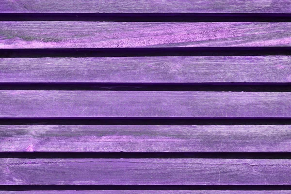 Purple-violet painted boards of an old village house. Texture and Background — Zdjęcie stockowe