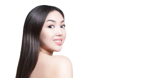 Portrait of a young Asian girl. On an isolated white background with a place to copy. The concept of skin and hair care — Stock Photo, Image
