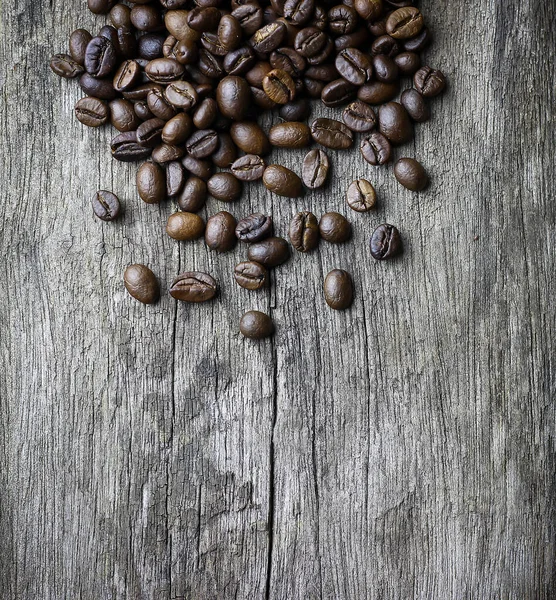 Picture Coffee Beans Stacked Wooden Floor Dark Background Copy Space —  Fotos de Stock