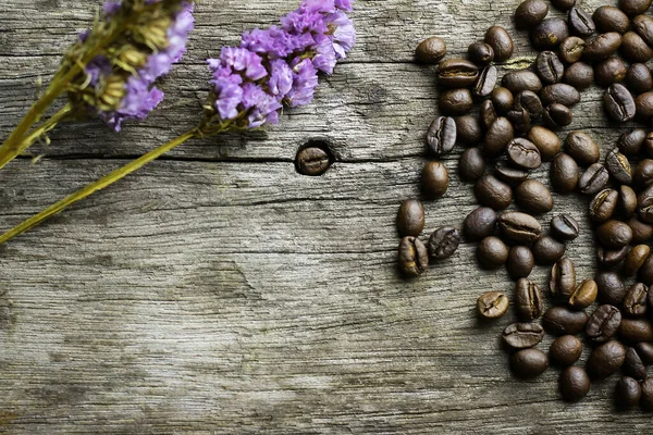 Picture Coffee Beans Stacked Wooden Floor Dark Background Copy Space — Zdjęcie stockowe