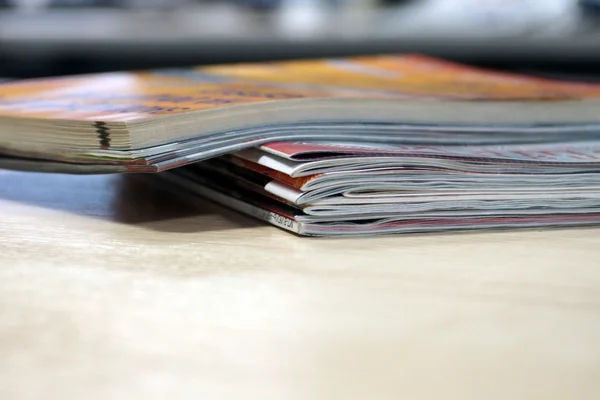 Magazine spread in the office, in the background and the reception office