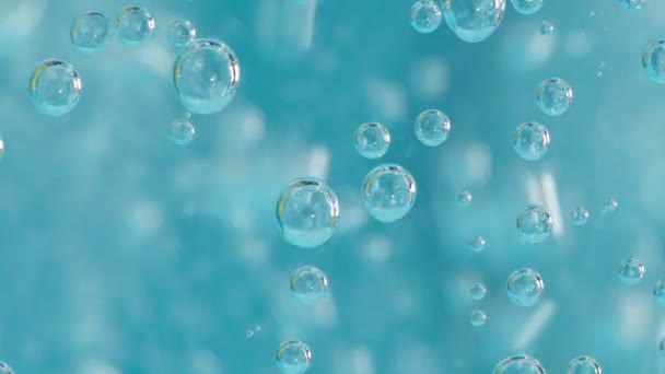 Bubbels onder water, achtergrond onttrekkingsvloeistof. Sluiten, macro. — Stockvideo