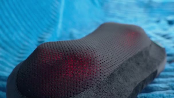 Electric massage pillow close up for relaxation. Massage pillow for neck and back. — Stock Video