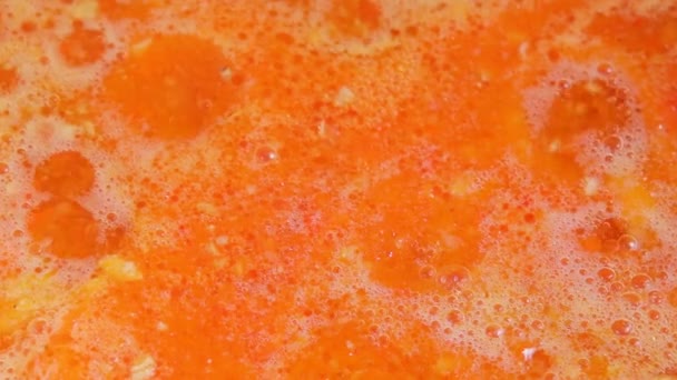 Cooking chili sauce close-up macro. Hot sauce. Food background — Stockvideo