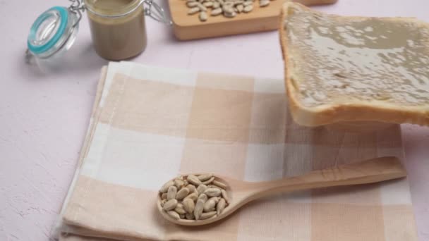 Homemade sunflower seed spread with seeds. Hypoallergenic alternative butter — Stock videók