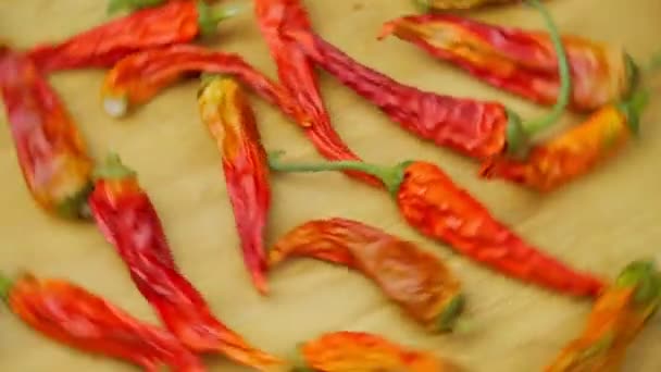Chili Peppers Spicy Seasoning Dried Red Peppers Wooden Table Background — Vídeo de stock