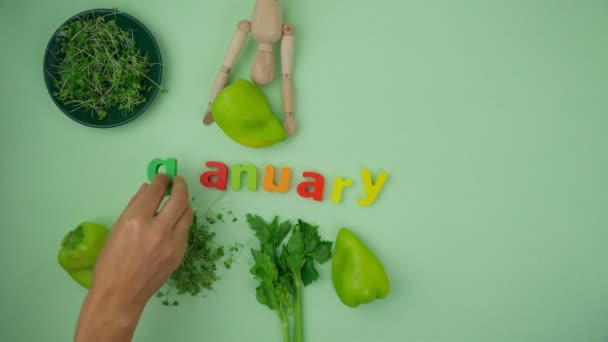 Word Veganuary Wooden Blocks Letters Green Background Healthy Plant Based — Stok video