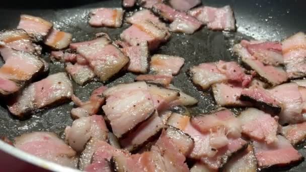 Roasted Chopped Crispy Bacon Strips Slices Hot Skillet Frying Pan — Wideo stockowe