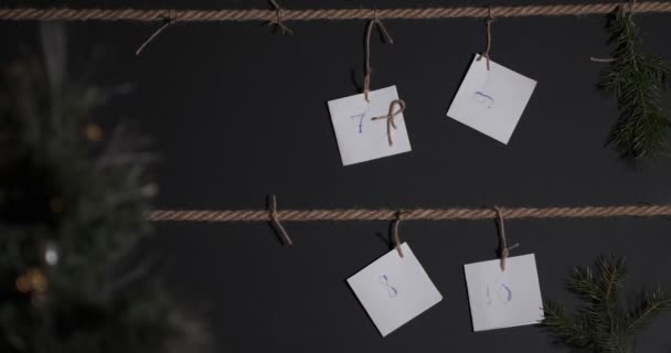 Homemade Diy Advent Calendar Created Black Background Tied Craft String — Stock Video
