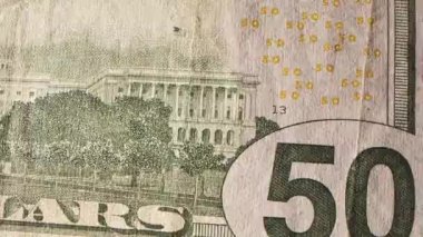 Macro bir sürü 100 Amerikan Doları. Nakit para banknotları. Franklinlerin yüz dokusu. Finans ve yatırım konsepti. Yakın plan çekim. 100 USD 'lik döviz değişimi. ABD 'nin zengin iş ekonomisi.