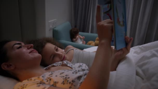Child Care Home Mom Takes Care Youngest Daughter Reads Bedtime — Stock Video