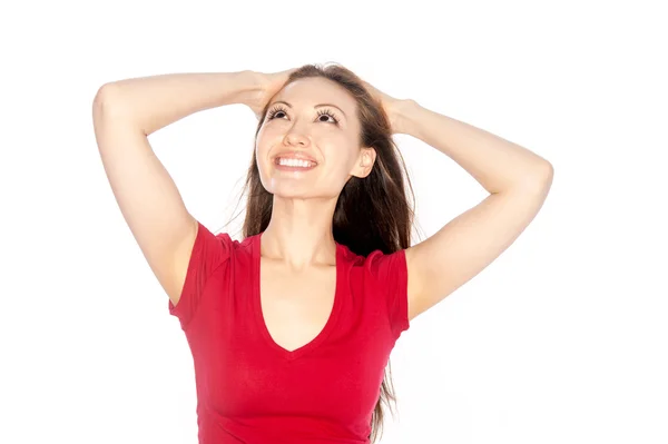 Asiática chica en rojo sobre un fondo blanco —  Fotos de Stock