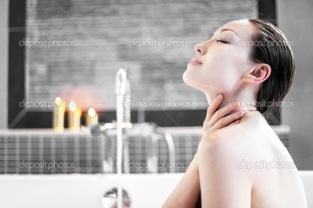 Attractive Mixed Asian Female Relaxing And Enjoying Hair Wash In