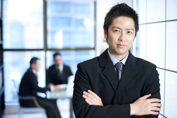 Confident asian businessman — Stock Photo, Image