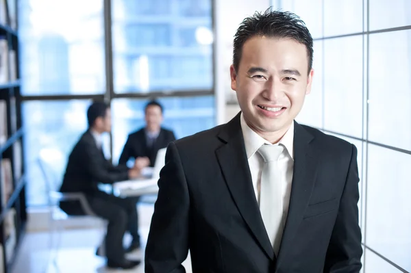 Smiling asian business man portrait — Stock Photo, Image