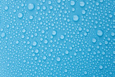Water drops on blue background, top view of pattern with drop, flat lay as overlay