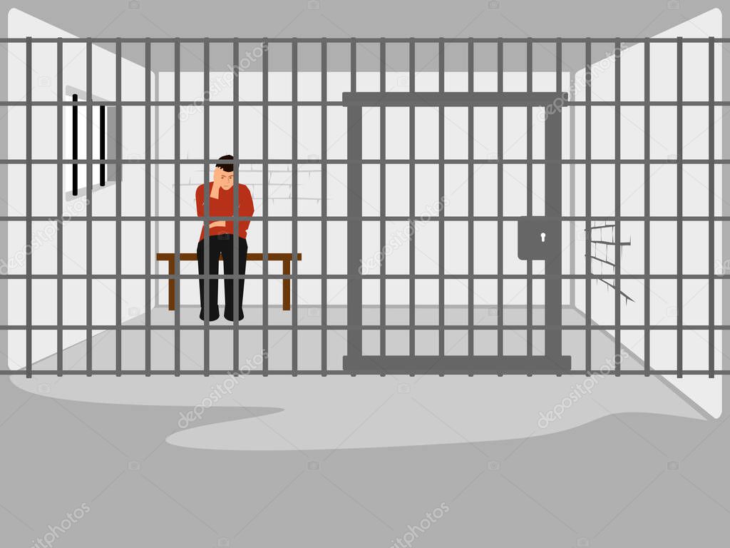 man sitting stressed in a prison cell with iron bars in the background