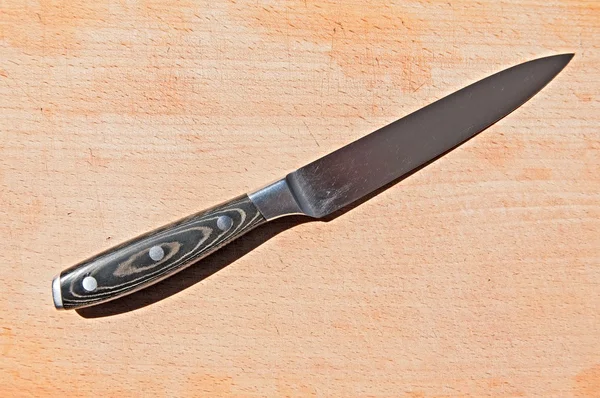 Tahta bıçak ile — Stok fotoğraf