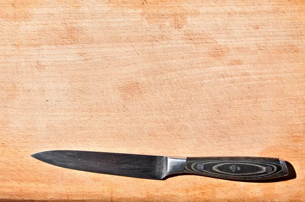 Нож на борту — стоковое фото