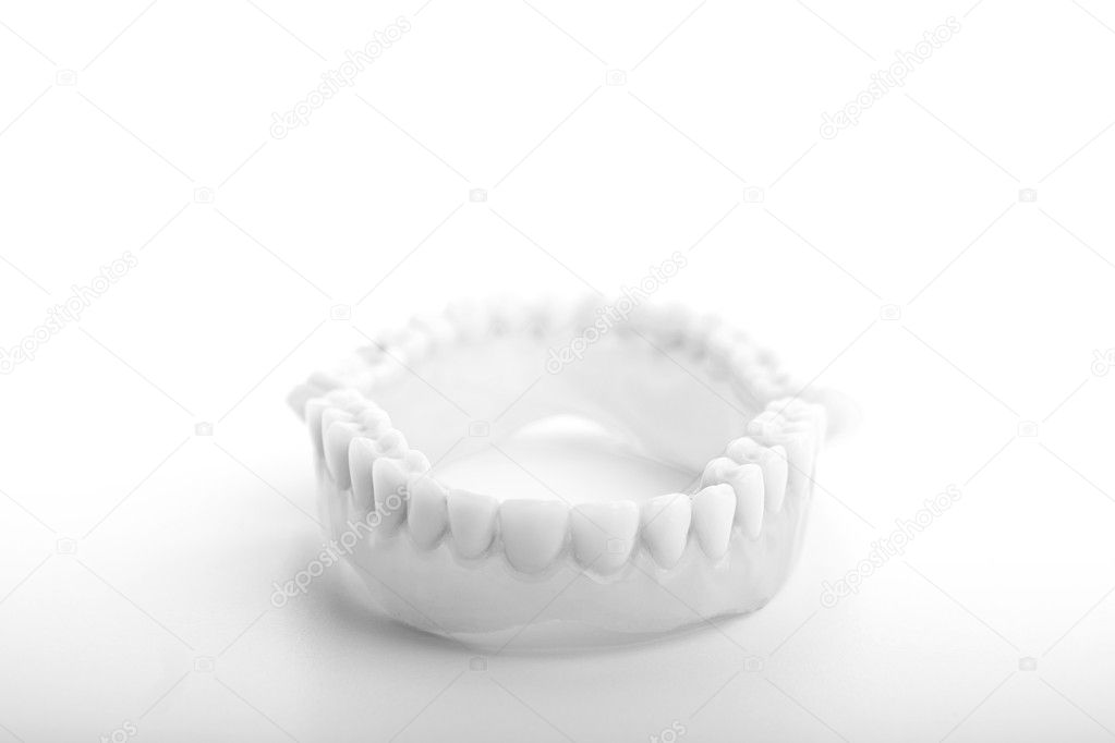 grey medical denture smile jaws teeth on white background