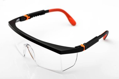 Protective safety glasses isolated on white background