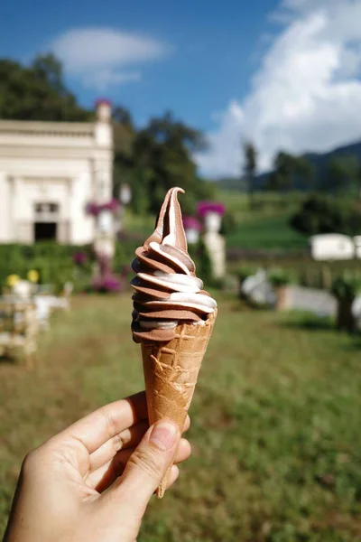 soft serve ice cream in a waffle cone