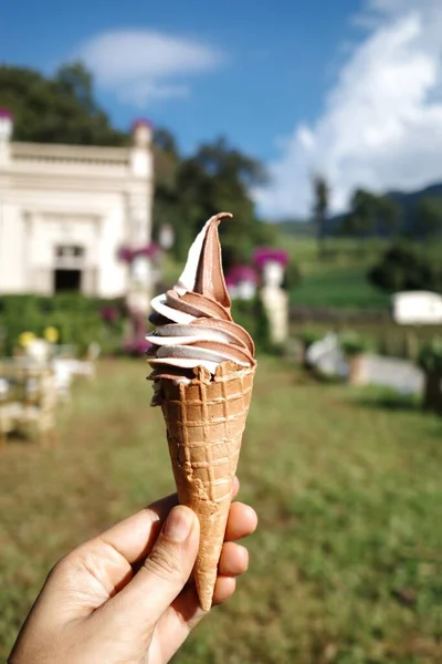 soft serve ice cream in a waffle cone