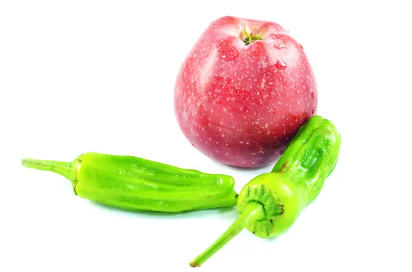 Apple with green peppers — Stock Photo, Image