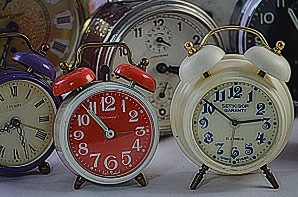 Ancient used alarm clocks — Stock Photo, Image