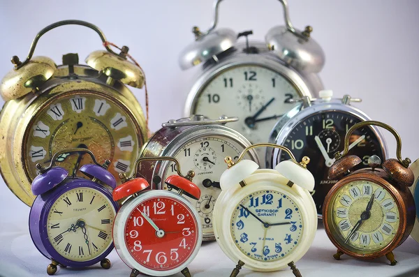 Ancient used alarm clocks Royalty Free Stock Photos