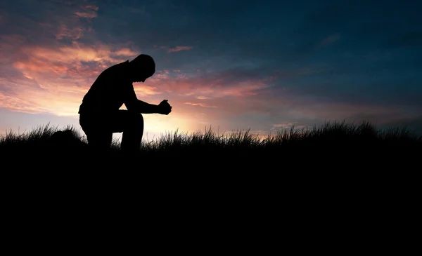Hombre rezando Imagen De Stock