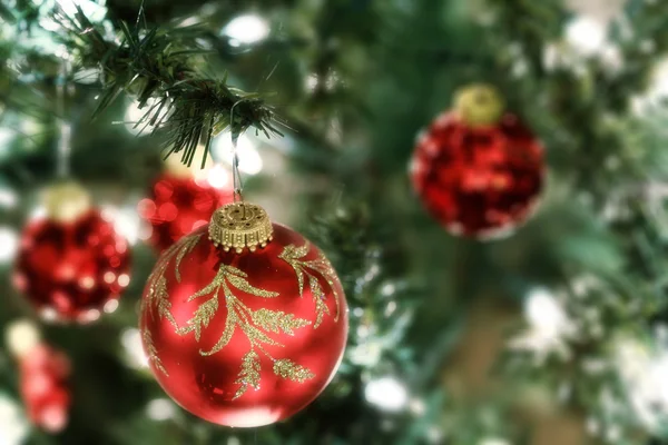 Bright red ornaments on Christmas background — Stock Photo, Image