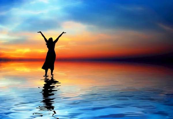 Woman praising in the water — Stock Photo, Image