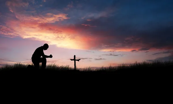 Praying over cross — Stock Photo, Image