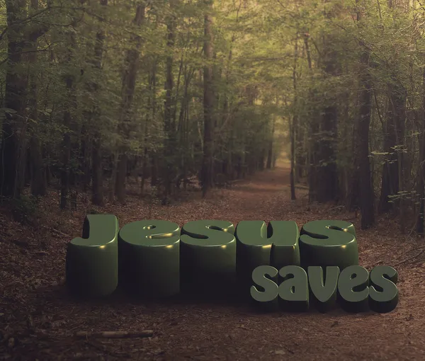 Große Buchstaben "Jesus rettet" im Wald — Stockfoto