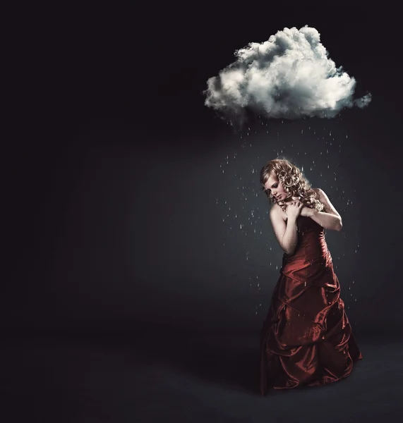 Cloud raining on top of woman — Stock Photo, Image